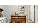 Rustic vanity featuring a vessel sink and antique dresser at 317 Ellenwood Dr, Bowdon, GA 30108