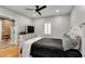 Cozy bedroom with a bed, dresser, and hardwood floors at 317 Ellenwood Dr, Bowdon, GA 30108