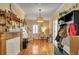 Inviting entryway with hardwood floors and decoratively appointed traditional accents at 317 Ellenwood Dr, Bowdon, GA 30108