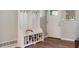 Inviting foyer with stylish coat rack, shoe storage, and wood-look flooring at 3833 Coral Ln, Douglasville, GA 30135