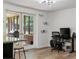 Bright home office area with glass doors and a view of the backyard at 3833 Coral Ln, Douglasville, GA 30135