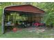 Spacious outdoor shed perfect for storing gardening equipment, tools, and other outdoor essentials at 3833 Coral Ln, Douglasville, GA 30135