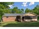 Home featuring an inviting sunroom with a screened-in porch, perfect for enjoying the outdoors from inside at 3833 Coral Ln, Douglasville, GA 30135