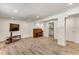 Spacious finished basement featuring recessed lighting, entertainment area, and a piano at 3990 Admiral Dr, Chamblee, GA 30341