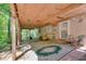 Finished basement walkout area with an area rug, seating, and an outdoor view at 3990 Admiral Dr, Chamblee, GA 30341