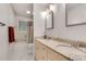 Bathroom with double sinks, granite countertop, shower and tub combo at 3990 Admiral Dr, Chamblee, GA 30341