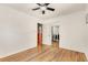 Clean bedroom with hardwood floors and an open walk-in closet space at 3990 Admiral Dr, Chamblee, GA 30341