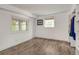 Spacious bedroom with hardwood floors, two windows and built-in wardrobe at 3990 Admiral Dr, Chamblee, GA 30341