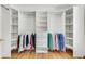 Large walk-in closet featuring built-in shelves and ample storage space at 3990 Admiral Dr, Chamblee, GA 30341