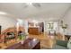 Open concept kitchen with central island, stainless appliances, and hardwood floors at 3990 Admiral Dr, Chamblee, GA 30341