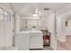Functional laundry room featuring modern washer and dryer units, and sink at 3990 Admiral Dr, Chamblee, GA 30341