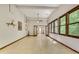 Spacious living room with many windows and tile flooring at 3990 Admiral Dr, Chamblee, GA 30341