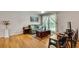 Bright living room with hardwood floors, large window, and comfortable seating arrangement at 3990 Admiral Dr, Chamblee, GA 30341