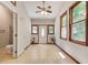 Inviting living room area features a vaulted ceiling, tile floor, and front and rear entry doors at 3990 Admiral Dr, Chamblee, GA 30341