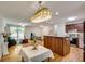 View of kitchen island adjacent to open living space at 3990 Admiral Dr, Chamblee, GA 30341