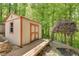 Charming outbuilding featuring deck in a lush wooded lot at 3990 Admiral Dr, Chamblee, GA 30341