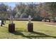 Entrance sign to Huntley Hills Park with playground equipment in the background at 3990 Admiral Dr, Chamblee, GA 30341