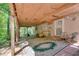 Spacious covered patio with stone ground and exterior access at 3990 Admiral Dr, Chamblee, GA 30341