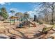 Community playground with slide, climbing structure, and benches at 3990 Admiral Dr, Chamblee, GA 30341