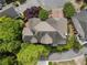 Aerial view of home and roof featuring mature landscaping and nearby houses at 4223 Wieuca Overlook Ne, Atlanta, GA 30342