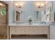 Bathroom vanity featuring double sinks, marble countertops, and a glass shower at 4223 Wieuca Overlook Ne, Atlanta, GA 30342