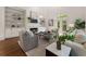 Cozy living room featuring fireplace, built-in bookshelves and backyard access at 4223 Wieuca Overlook Ne, Atlanta, GA 30342