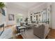 Inviting living room with large windows, fireplace, and comfortable seating arrangement at 4223 Wieuca Overlook Ne, Atlanta, GA 30342