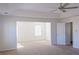 Bright bedroom featuring carpet floors, a fan, and natural light from the window at 6980 Talkeetna Sw Ct, Atlanta, GA 30331