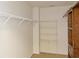 Spacious walk-in closet with ample shelving and storage at 6980 Talkeetna Sw Ct, Atlanta, GA 30331