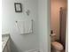 This bathroom contains a granite vanity, towels, decor, and toilet room at 82 Hinton Farm Way, Dacula, GA 30019