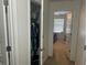 Walk in closet view with plenty of space and an open view into the bedroom at 82 Hinton Farm Way, Dacula, GA 30019