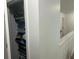 A closet that contains many items such as clothing, backpacks, and shoes at 82 Hinton Farm Way, Dacula, GA 30019