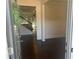 Elegant foyer with hardwood floors and staircase, showcasing the home's open layout and design at 82 Hinton Farm Way, Dacula, GA 30019