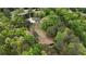 Scenic aerial view of the property highlighting lush landscape and wooded areas at 9680 Ephesus Church Rd, Villa Rica, GA 30180