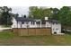 Beautiful home featuring a large back deck perfect for outdoor entertaining at 9680 Ephesus Church Rd, Villa Rica, GA 30180