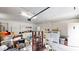 Cluttered garage interior with storage solutions and laundry area, ready for organization at 9680 Ephesus Church Rd, Villa Rica, GA 30180