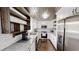 Charming kitchen features wooden ceiling, stainless appliances and white cabinets at 9680 Ephesus Church Rd, Villa Rica, GA 30180