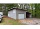 Large outbuilding with two garage doors, plus an additional carport at 9680 Ephesus Church Rd, Villa Rica, GA 30180