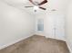 This carpeted bedroom offers great closet space, a ceiling fan and great natural light at 1307 Madison Se Ln, Smyrna, GA 30080