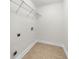 Walk-in closet with tile floor and wire shelving for organized storage space at 1307 Madison Se Ln, Smyrna, GA 30080
