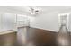 Spacious open-concept living room featuring sleek floors and neutral walls at 1307 Madison Se Ln, Smyrna, GA 30080