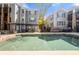Exterior shot of a sparkling pool, patio, and lounge chairs at 1307 Madison Se Ln, Smyrna, GA 30080