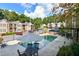 Community pool surrounded by seating and well-maintained landscaping at 1307 Madison Se Ln, Smyrna, GA 30080