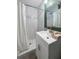 Tastefully updated bathroom with modern vanity and walk-in shower at 2377 Emory Ln, Marietta, GA 30068