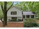 Charming two-story home with a well-manicured lawn and landscaping at 2377 Emory Ln, Marietta, GA 30068