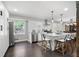 Bright, open kitchen with stainless steel appliances, a marble island, and a view of the outdoor greenery at 2377 Emory Ln, Marietta, GA 30068