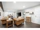 Comfortable living area featuring hardwood floors, exposed beams, and views of the surrounding neighborhood at 2377 Emory Ln, Marietta, GA 30068