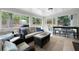 Relaxing sunroom with comfortable seating and views of the backyard at 2377 Emory Ln, Marietta, GA 30068