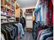 Organized walk-in closet with custom shelving, hanging rods, and ample storage space at 2377 Emory Ln, Marietta, GA 30068