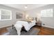 Cozy bedroom with natural light, a comfortable bed, and tasteful decor at 3383 Campbell Se Rd, Smyrna, GA 30080